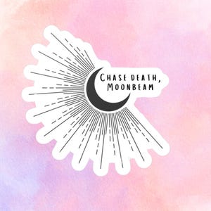 May include: A white sticker with a black crescent moon and sunburst design. The text "CHASE DEATH, MOONBEAM" is written in black. The background is a watercolor wash of pink and purple.