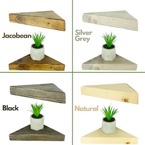 May include: Four triangular wooden shelves in different finishes: Jacobean, Silver Grey, Black, and Natural. Each shelf is shown with a small potted plant.