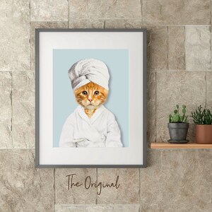 Funny cat in a custom pet portrait with a robe in the bathroom.