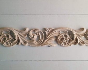 baguette de madera tallada