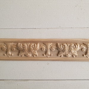 aus Holz geschnitztes Baguette