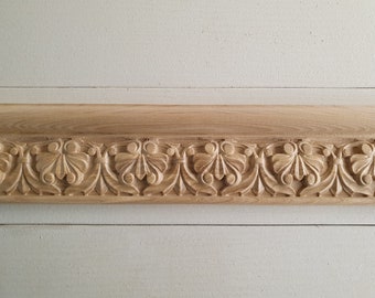 baguette de madera tallada