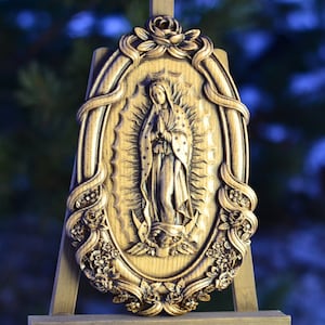 Virgin Mary made of wood, Our Lady of Guadalupe. Religious catholic icons made of wood.