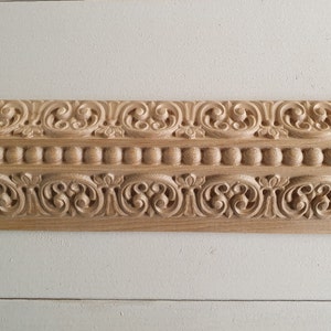 aus Holz geschnitztes Baguette