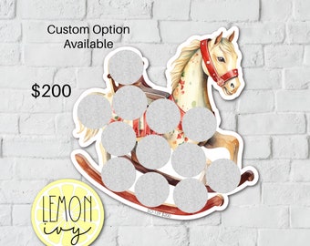 May include: A white rocking horse with red and white details. The horse has a red bridle and a white saddle. The rocking horse is on a white brick wall background. The text "Custom Option Available" and "$200" are visible in the image.