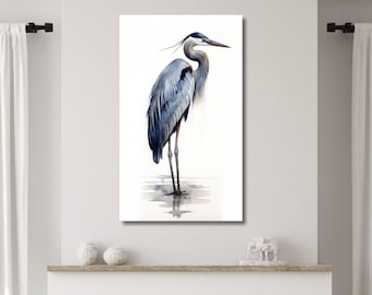 May include: Watercolor painting of a blue heron standing in a shallow body of water. The heron is facing to the right and has its head turned to the left. The background is white.