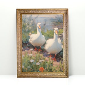 May include: A framed painting of two white ducks walking through a field of green grass and white flowers. The ducks have orange beaks and feet. The background is a blurry image of a pond and blue sky.