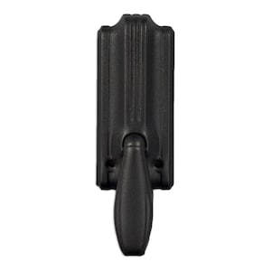 May include: Black cast iron door handle with a vertical rectangular plate and a lever handle. The handle has a textured surface and a slightly curved design.