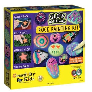 May include: A Creativity for Kids rock painting kit with glow-in-the-dark paint. The box shows 10 rocks and instructions for painting, hiding, and watching them glow. The box is yellow with a blue and white logo.