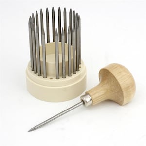 May include: A set of 20 metal tools for jewelry making, with a wooden handle, in a white plastic holder.
