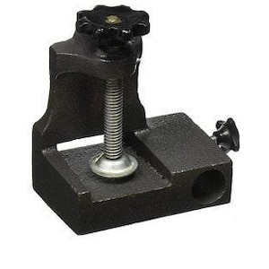 Clamp-on bench anvil for holding wooden pin, ring or bracelet mandrel