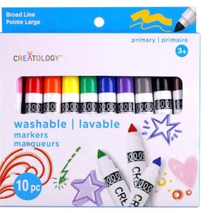 May include: A box of Creatology washable markers in primary colors. The box includes ten markers with a variety of colors, including pink, red, orange, yellow, green, blue, purple, gray, black, and brown. The box also features drawings of a star, a heart, and other doodles.