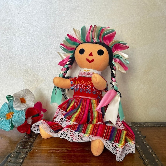 La muñeca maría sale