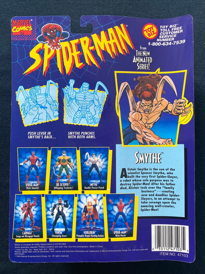Puede incluir: Una figura de acci&oacute;n de Spider-Man de la nueva serie animada. La figura es roja y azul con un s&iacute;mbolo de ara&ntilde;a negro en el pecho. La figura sostiene un lanzatelara&ntilde;as en una mano. La figura est&aacute; empaquetada en una caja de cart&oacute;n con una imagen de Spider-Man en la parte delantera. La caja tambi&eacute;n tiene una imagen del villano Smythe, que es el hijo del cient&iacute;fico que construy&oacute; el primer Spider-Slayer. La caja tambi&eacute;n tiene una imagen del villano Carnage, que es un simbionte que se ha unido a un hu&eacute;sped humano. La caja tambi&eacute;n tiene una imagen del villano Venom, que es un simbionte que se ha unido a un hu&eacute;sped humano. La caja tambi&eacute;n tiene una imagen del villano Hobgoblin, que es un villano que usa una bomba de calabaza. La caja tambi&eacute;n tiene una imagen del villano Dr. Octopus, que es un villano que usa tent&aacute;culos. La caja tambi&eacute;n tiene una imagen del villano Smythe, que es un villano que usa un doble golpe de poder.