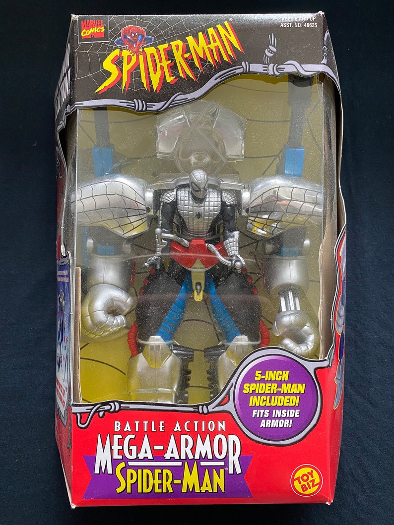 Pode incluir: Uma figura de a&ccedil;&atilde;o de Spider-Man prateada e vermelha em uma grande armadura de batalha prateada. A embalagem inclui o texto "Battle Action Mega-Armor Spider-Man" e "5-inch Spider-Man Included! Fits inside armor!"