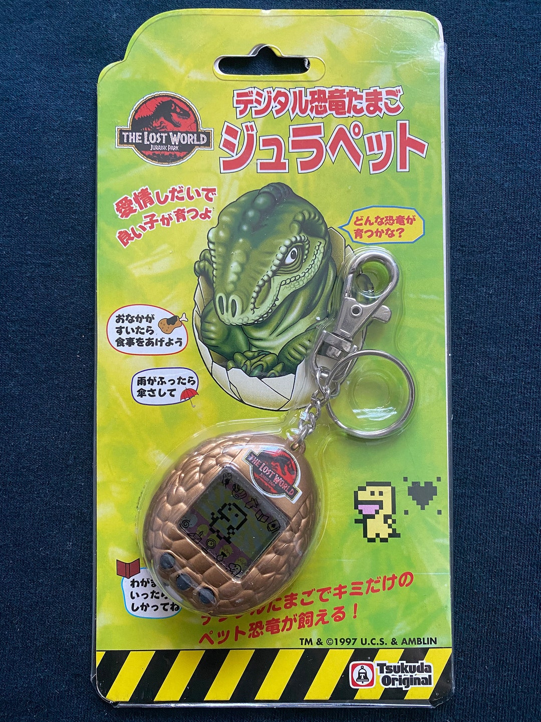 【たまこ】オーダーページ Vintage 1997 Jurassic Park Dino Egg Tamagotchi - Japanese Virtual
