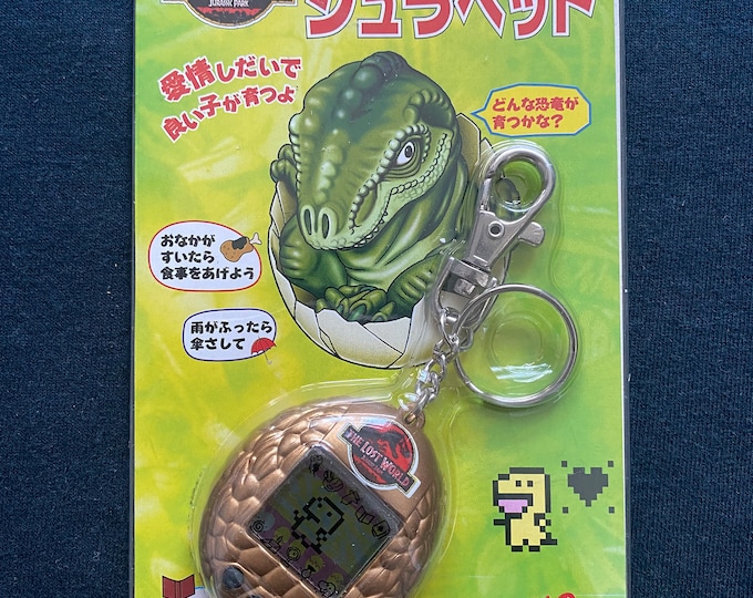 Vintage 1997 Jurassic Park Dino Egg Tamagotchi - Japanese Virtual Pet ...