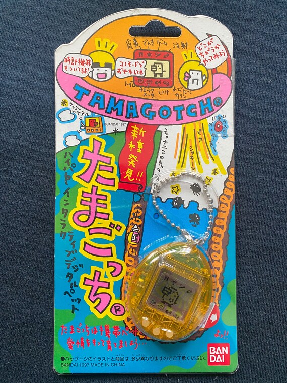 Vintage 1997 Bandai Tamagotchi Color Amarillo Claro Ver