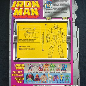 K&ouml;nnte beinhalten: Eine Plastik-Actionfigur von U.S. Agent aus Marvel Comics. Die Figur tr&auml;gt ein rot-wei&szlig;-blaues Kost&uuml;m mit einem Schild am Arm. Die Figur ist in einer dynamischen Actionpose dargestellt. Die Figur ist Teil einer Sammlung von Marvel Comics Actionfiguren.
