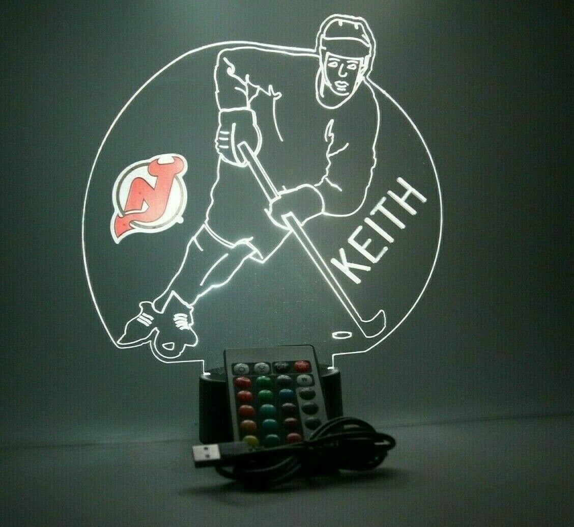 New Jersey Devils Original Round Rotating Lighted Wall Sign