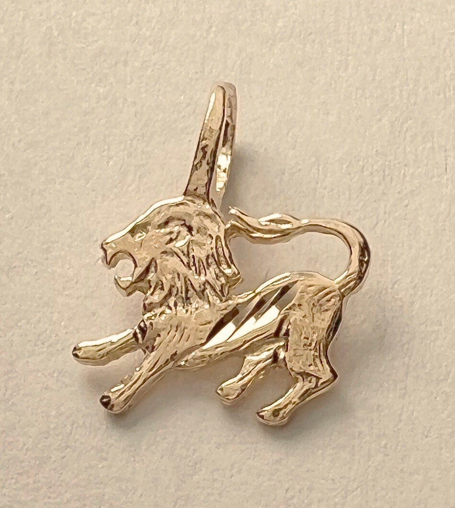 Gold lion charm sale