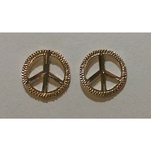 Aretes nuevos con el signo de la paz en oro amarillo de 14 k