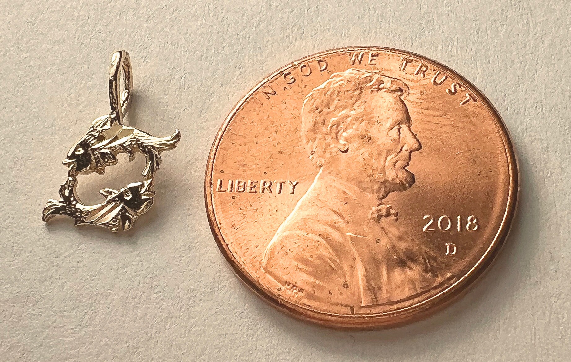 14K Yellow Gold Pisces Zodiac Sign Pendant | Jewelry America