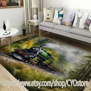May include: A green and black train engine with smoke coming from the chimney, on a green and brown rug with a watercolor effect.