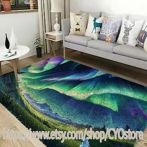 May include: A colorful abstract rug with a green, blue, and purple design. The rug features a swirling pattern reminiscent of the aurora borealis. The rug is laid out on a hardwood floor in a living room setting.