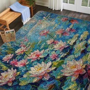 May include: A large, rectangular rug with a floral design. The rug features a vibrant blue background with detailed depictions of pink and white lotus flowers and green lily pads. The rug's design is reminiscent of an impressionist painting.
