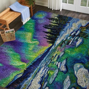 May include: A rectangular area rug featuring a vibrant, textured landscape design with swirling patterns of purple, green, and blue. The imagery depicts a dark forest silhouette against a colorful sky, with light-colored rock formations.