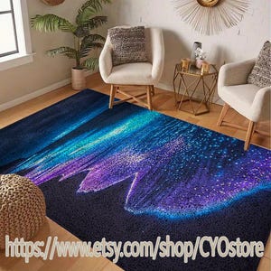 May include: A dark blue and purple abstract area rug with a glittery finish. The rug has a design of swirling colours and a light blue and white wave pattern.