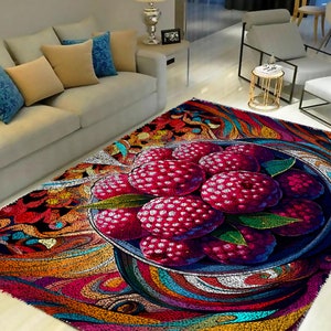 May include: A colorful rug with a design of a bowl of red berries. The rug has a swirling pattern of blue, green, yellow, orange, and red.