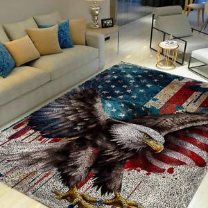 May include: Area rug featuring a bald eagle with outstretched wings, set against a backdrop of the American flag. The rug has a distressed, vintage look with red, white, and blue colors. The eagle's feathers are detailed in shades of brown and gray.