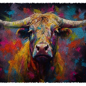 May include: A colorful abstract painting of a brown and white cow with large horns. The background is a dark blue with splashes of pink, yellow, orange, and green paint.