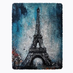 May include: A black and white illustration of the Eiffel Tower on a blue and white textured background.