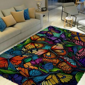 May include: A colorful rug with a butterfly design. The rug features a variety of butterflies in shades of blue, green, yellow, orange, pink, and purple. The butterflies are arranged in a random pattern on a dark background.