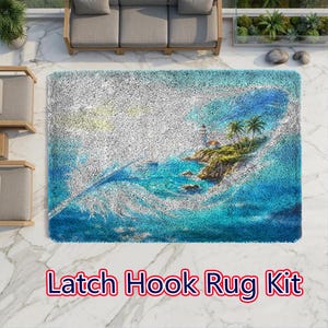 May include: A rectangular latch hook rug kit featuring a textured design of a white feather shape overlaying a tropical island scene with a lighthouse, palm trees, and blue ocean water. The rug displays a vibrant mix of blue, white, and green tones.