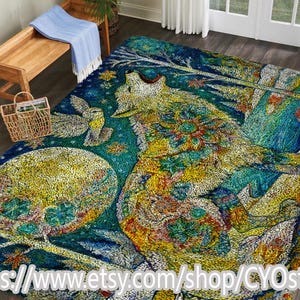 May include: A colorful, artistic rug featuring a howling wolf, a full moon, and an owl. The rug has a blue background with yellow, orange, and green accents. The rug is a decorative floor covering.