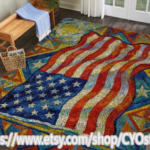 Op de afbeelding: Een groot, kleurrijk tapijt met een gestileerd Amerikaans vlagontwerp. Het tapijt toont de sterren en strepen van de vlag in tinten blauw, rood en wit, met een getextureerd uiterlijk. De Etsy shop URL is onderaan zichtbaar.