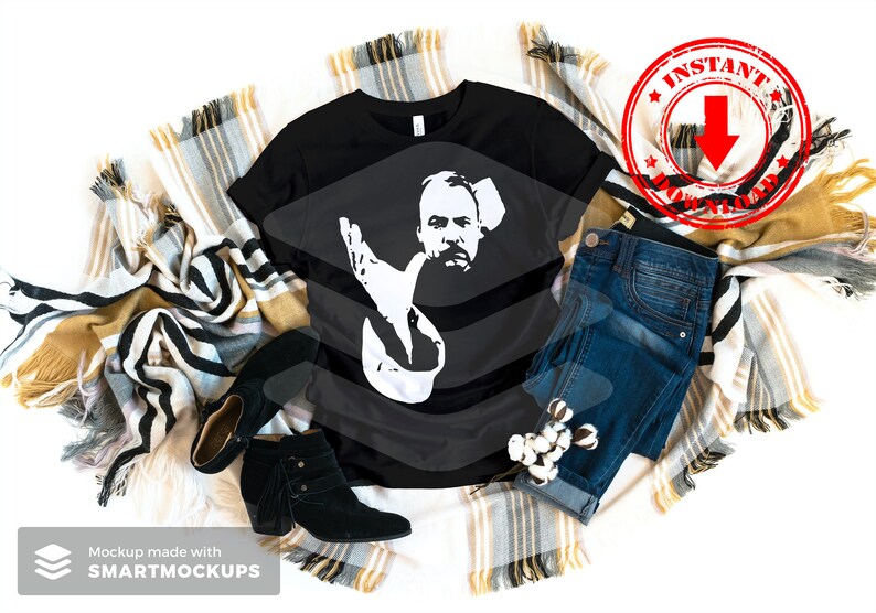 May include: A black t-shirt with a white silhouette of a man with a beard and mustache. The t-shirt is laid out on a blanket with a pair of black ankle boots and blue jeans. The text "INSTANT DOWNLOAD" is on a red circle stamp.