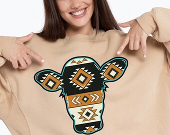 May include: A tan sweatshirt featuring a cow head design with a Southwestern pattern in black, tan, and cream colors. The words "ONLY DIGITAL DOWNLOAD" and "INSTANT DOWNLOAD Png" are also visible.