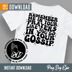 May include: Black and white graphic design with the text "Remember me in your prayers like you do in your gossip". The design features a pair of hands in a praying position.