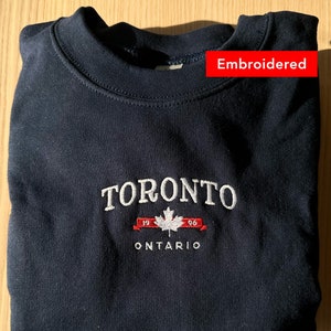 Sweat-shirt Toronto, col rond vintage Canada brodé