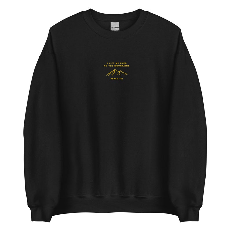 May include: Black sweatshirt with a yellow embroidered mountain design and the text "I lift my eyes to the mountains, Psalm 121".