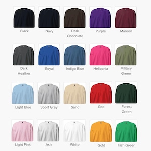 May include: A chart showing 20 different color options for a sweatshirt. The colors include black, navy, dark chocolate, purple, maroon, dark heather, royal, indigo blue, heliconia, military green, light blue, sport grey, sand, red, forest green, light pink, ash, white, gold, and Irish green.