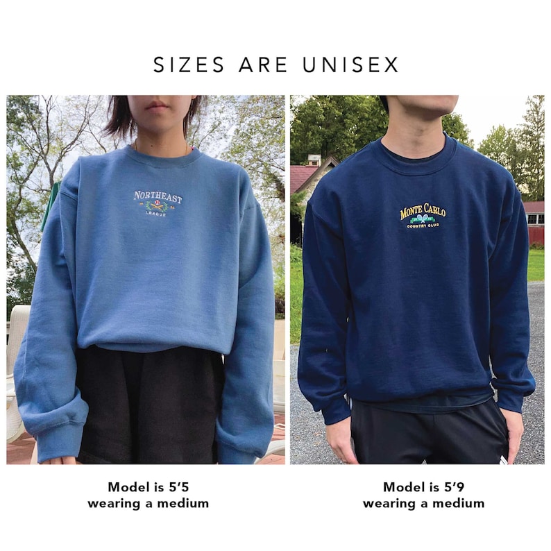 May include: Two models wearing blue crewneck sweatshirts with embroidered logos. The sweatshirt on the left is light blue with the text "Northeast League" and the sweatshirt on the right is dark blue with the text "Monte Carlo Country Club".