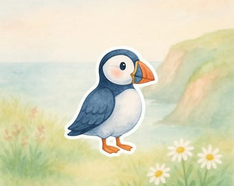 May include: A watercolor illustration of a puffin bird with a blue and white body, orange feet, and a large orange and blue beak. The bird is standing in a grassy area with daisies, with a coastal background.