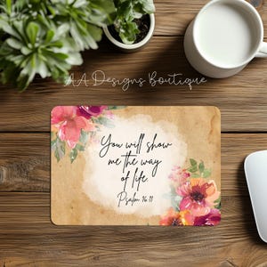 May include: A beige mouse pad with a watercolor floral design and the text "You will show me the way of life. Psalm 16:11"