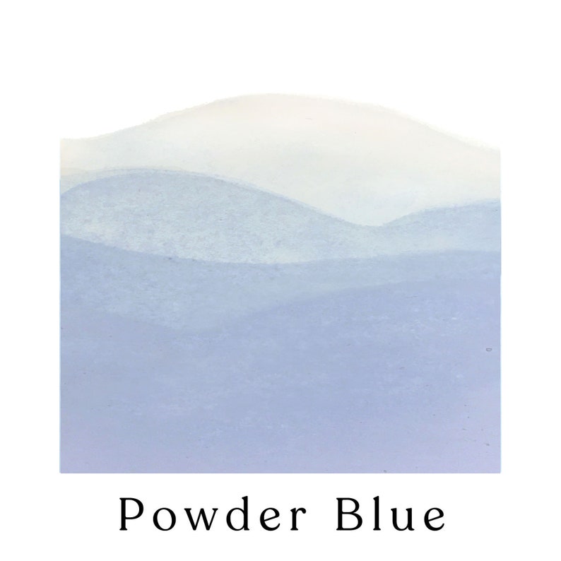 May include: A light blue watercolor wash with a gradient from white to a soft blue. The color is described as "Powder Blue".